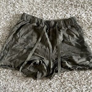 Brand is Thread and Supply, XS, green shorts with floral black lines.